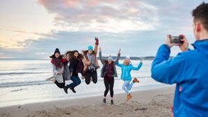 Swansea university students on the beach